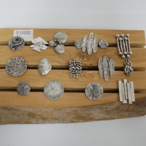 a)  Hevi ringen.  Zamak